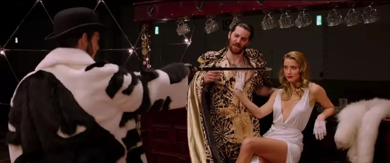 Hollywood beauty Amber Heard strips off and appears alongside her ex-husband Johnny Depp in the first scenes from long delayed movie thriller London Fields.