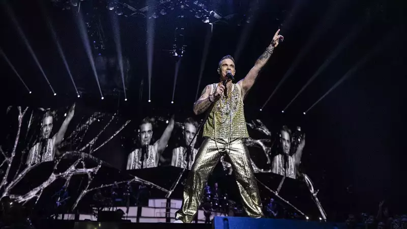 Cerințele lui Robbie Williams pentru concertul de la București. Artistul vrea un meniu special, cu mușchi de vită, foie gras și desertul său preferat