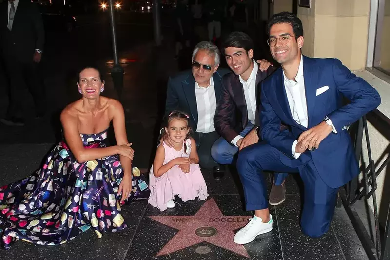 *EXCLUSIVE* Italian tenor Andrea Bocelli poses with his pretty family by his star on the Hollywood Walk of Fame!