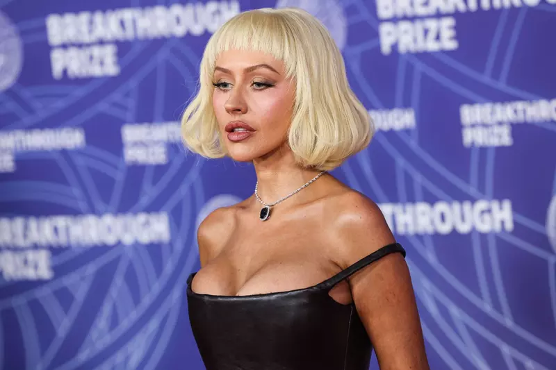 SANTA MONICA, LOS ANGELES, CALIFORNIA, USA – APRIL 18: Christina Aguilera wearing Salih Balta SS25 RTW and Leviev jewelry arrives at the 12th Annual Breakthrough Prize Ceremony 2026 held at the Barker Hangar on April 18, 2026 in Santa Monica, Los Angeles,