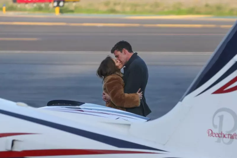 *EXCLUSIVE* Ben Affleck and Jennifer Lopez pack on the PDA as her pilot waits ahead of a flight out of LA