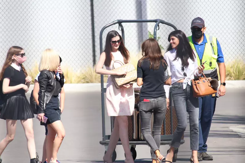 Lavinia Postaloche and Monica Gabor arrive at Las Vegas Mc Carran Airport to board a private jet en Route to LA!