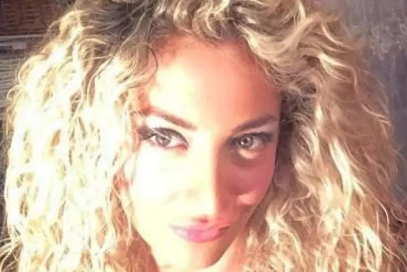 5399746_1759_berlusconi_mano_nella_mano_marta_fascina