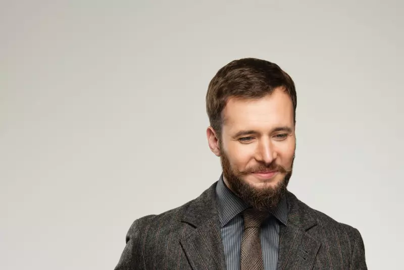 Smiling,Man,On,Yellow,Background