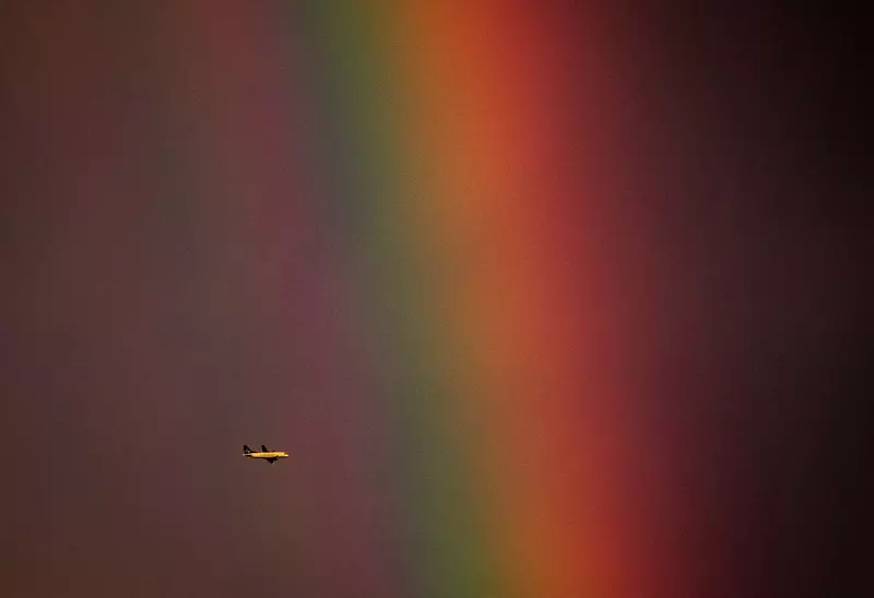 An Aircraft Passes In Front Of A Rainbow – Vancouver