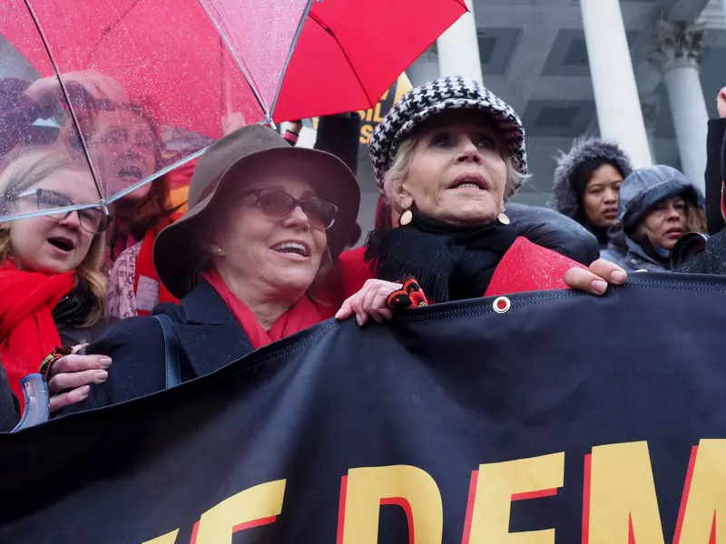 Sally Fields and Jane Fonda stand on the steps of the US Capitol during the Fire Drill Friday rally, with the demand for a Green New Deal..