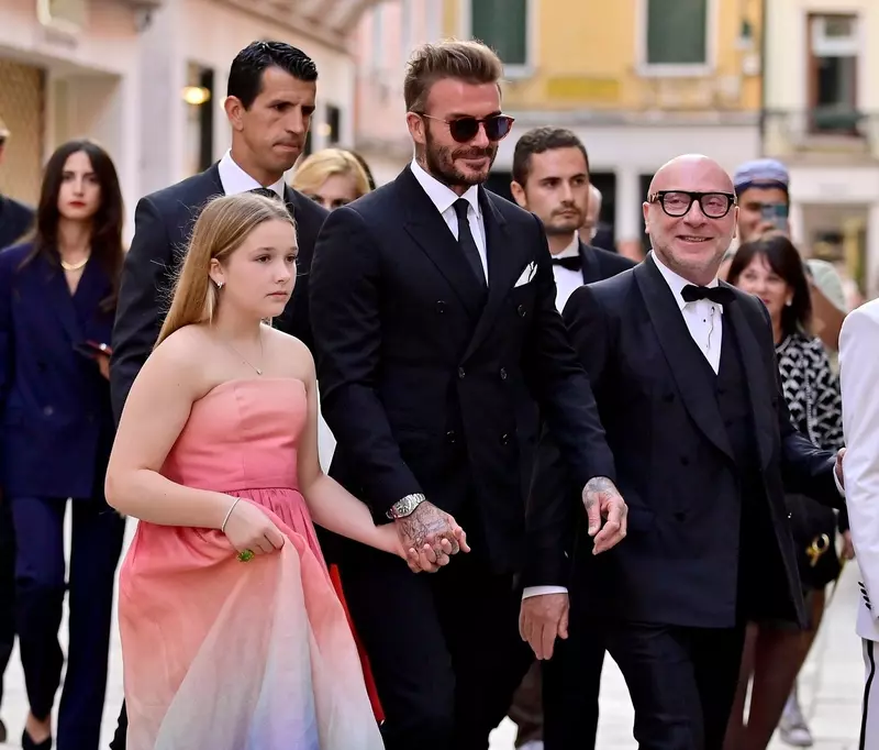 *PREMIUM-EXCLUSIVE* *MUST CALL FOR PRICING* Former England footballer David Beckham looks dapper while pictured with his daughter Harper Seven together with Domenico Dolce going to the Riva event at the Fenice theatre in Venice.
