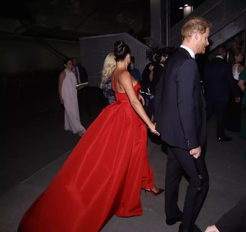 Prince Harry and Meghan Markle smile and laugh with veterans on the red carpet and are very animated as they attend a gala on eve of Veteran’s Day in NYC