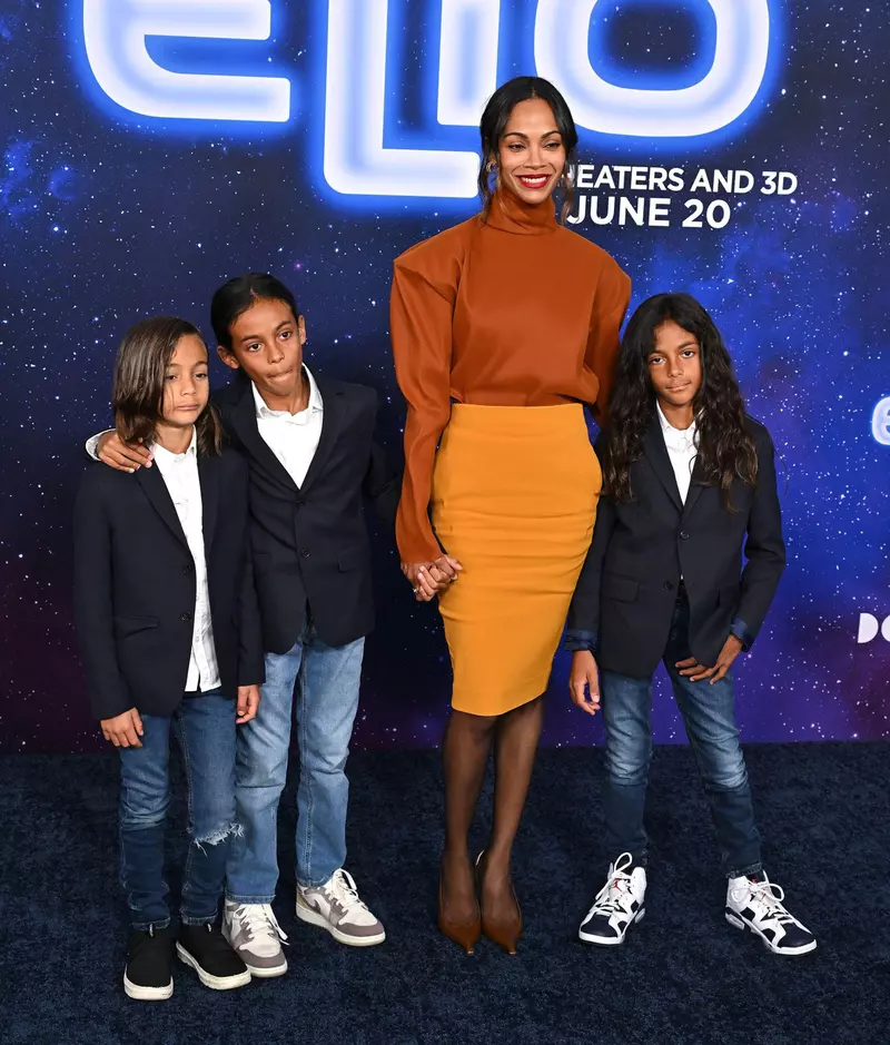 Zoe Saldana, Zen Anton Hilario Perego and Cy Arido Perego and Bowie Ezio Perego arriving to Disney Pixar’s “Elio” Los Angeles premiere held at the El Capitan Theatre on June 10, 2025 in Hollywood, Ca. © Starbuck/ AFF-USA.COM